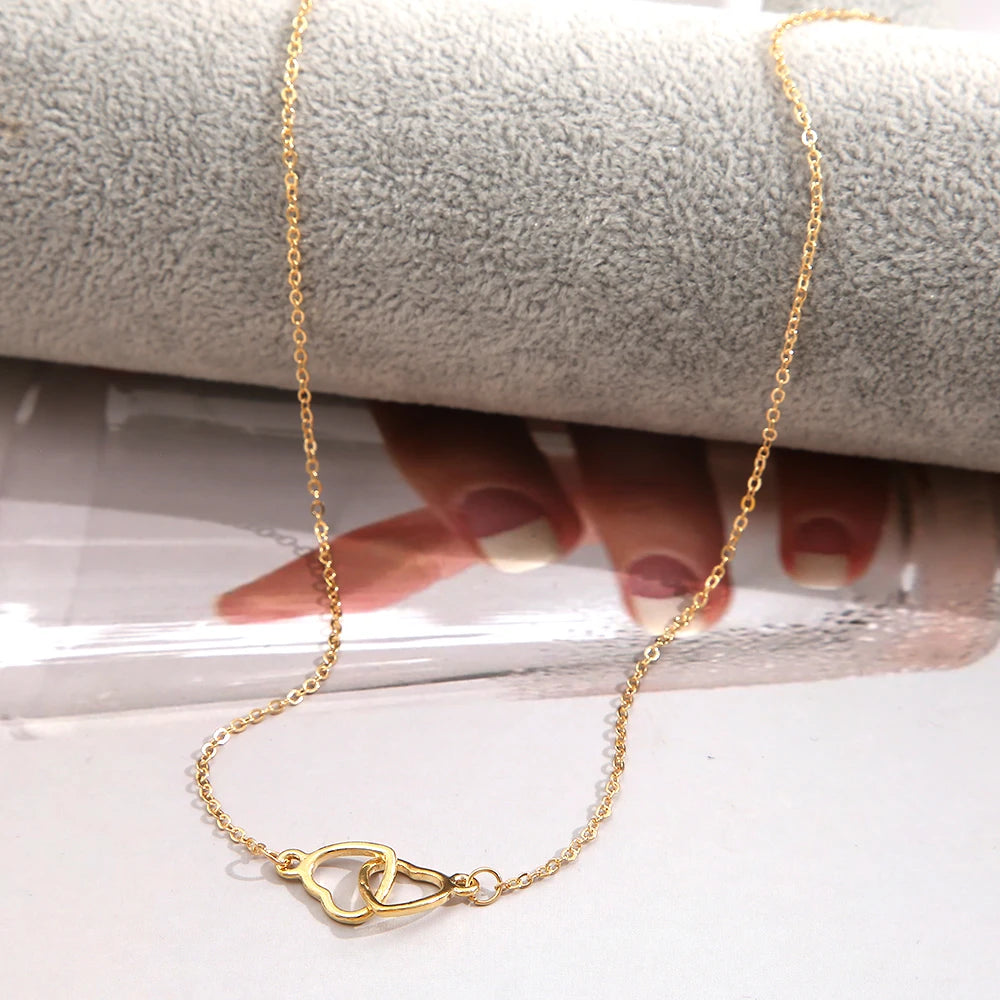 “Linked Double Heart Necklace – Simple Silver Clavicle Chain”