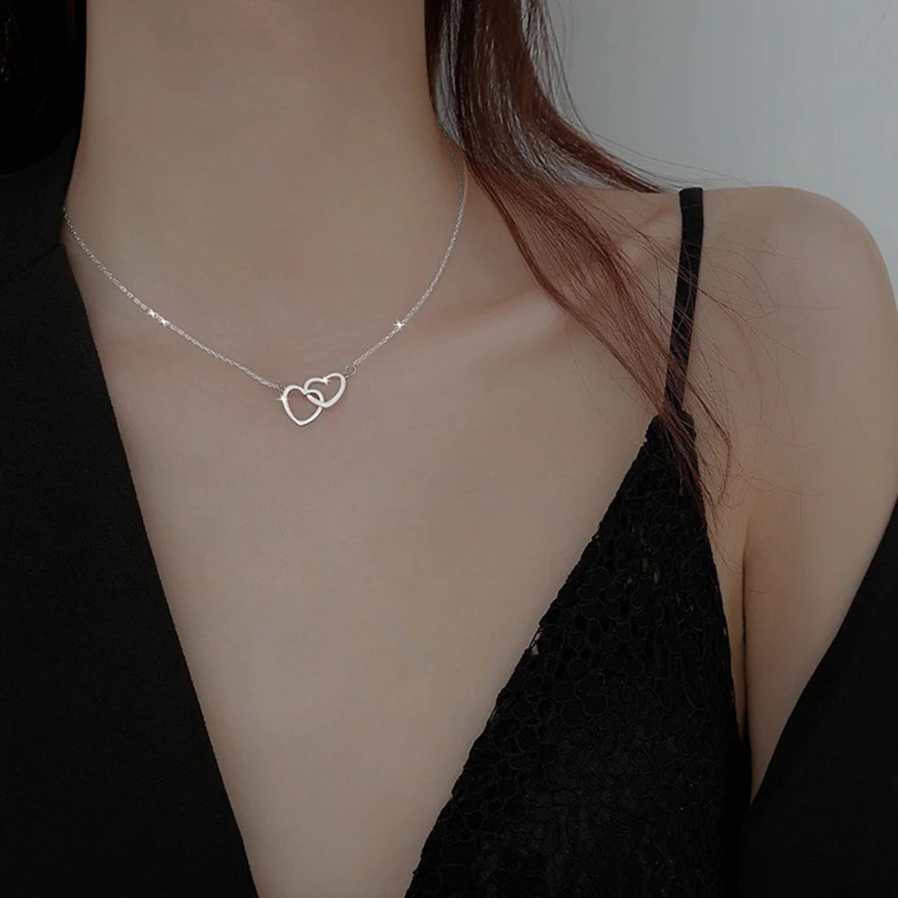 “Linked Double Heart Necklace – Simple Silver Clavicle Chain”